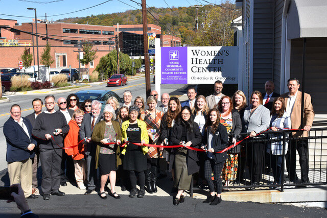 Ribbon cutting at new Women's Health Center on Park Street, Honesdale, during the Midwifery Mingle in fall 2022.